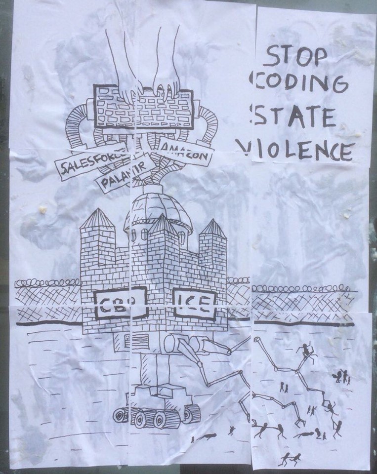 A poster saying 'Stop coding state violence' A poster saying 'Stop coding state violence'