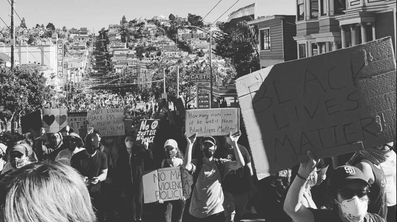 Protestors carry signs featuring statements like black lives matter, no justice no peace, and more Protestors carry signs featuring statements like black lives matter, no justice no peace, and more