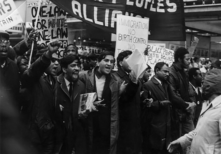 Old image showing a march. Old image showing a march.