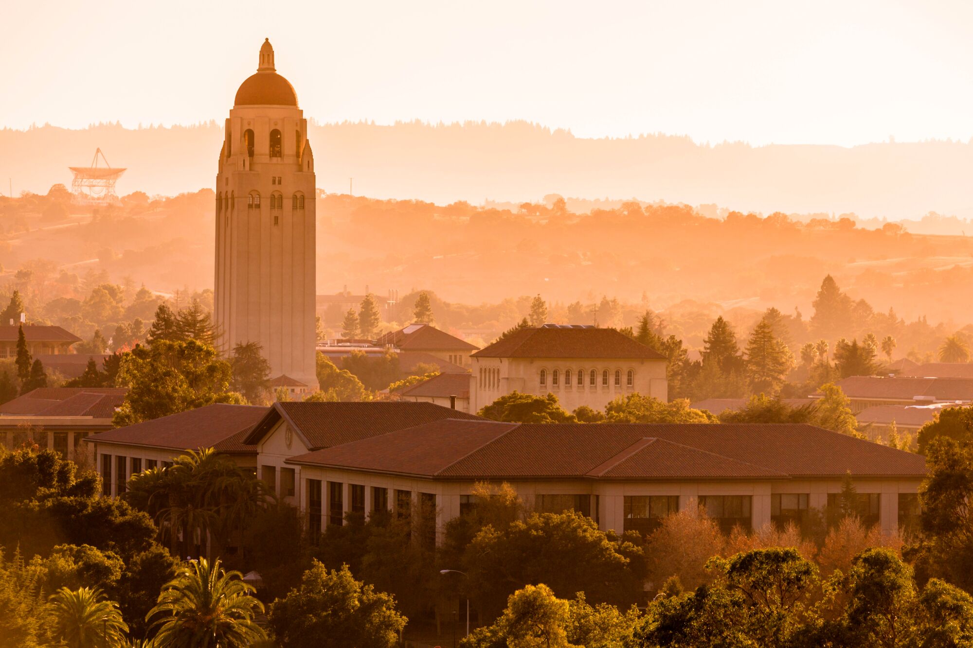 A sepia-tone photo of Stanford University campus, showing the conservative Hoover Institution tower and the radar dish built by the United States Air Force A sepia-tone photo of Stanford University campus, showing the conservative Hoover Institution tower and the radar dish built by the United States Air Force